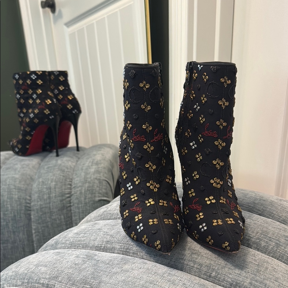 Christian Louboutin Black and Gold Heeled Boots with Signature Red Sole